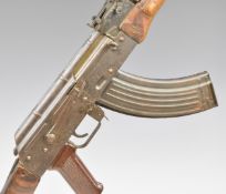 Deactivated AK47 7.62x54mm assault carbine rifle with wooden pistol grip, adjustable sights and 40cm