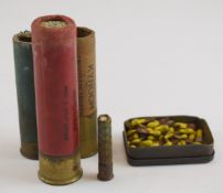 Three collectable 12 bore shotgun cartridges comprising Eley and empty Knoch and Joyce's and a