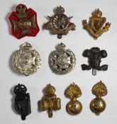 Ten British Army Infantry cap badges including the Tyneside Irish Army Cyclist Corps, Rifle