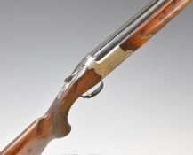 IAB Tiger Trap 12 bore over under ejector shotgun with engraved locks, trigger guard, underside, top