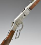 Winchester style lever action replica rifle with wooden stock and base metal action, 100cm long.