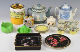 A collection of Carltonware including two vintage teapots, teapot stand, tobacco jar decorated