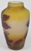 Emile Gallé cameo glass vase with purple decoration of flowers and foliage over a yellow and clear