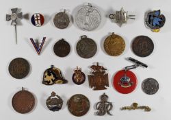 A small collection of medallions and badges including, the Civil Defense Corps, Gaunt London with '
