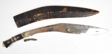 Kukri knife of large proportions with lion head pommel and some etching including India to 55cm