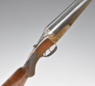 Thomas Wild 12 bore side by side shotgun with line engraved lock, trigger guard, thumb lever, fences