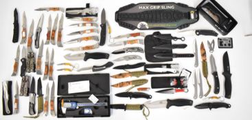 Approximately fifty hunting, folding, throwing knives most with sheaths together with associated
