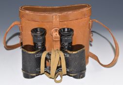 Cased pair of Fournier Paris x8 military binoculars, also marked with broad arrow to back