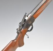Browning Model 1885 .45-70 falling block rifle with adjustable pop-up peep-hole sights, chequered