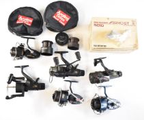 A collection of fixed spool fishing reels including Shimano baitrunners 5010 and 6010 and Mitchell