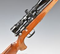 Anschutz .22 bolt-action rifle with chequered semi-pistol grip and forend, raised cheek piece to the