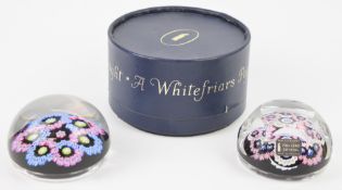 Two Whitefriars glass paperweights, both with patterned canes, one a faceted example for Queen
