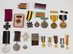 Small collection of medals including copy Victoria Cross, copy Ashanti Star etc and a hallmarked