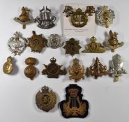Twenty British Army cap badges including Army Educational Corps, Army Cyclists Corps, Royal