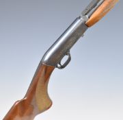 Browning .22 semi-automatic take-down rifle with chequered semi-pistol grip, engraved lock, scope