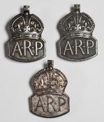 Three hallmarked silver Air Raid Precaution (ARP) badges