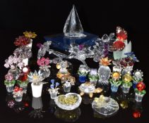 Thirty Swarovski Crystal glass ornaments including Crystal Memories, flowers, sailing ship etc,