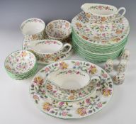 Minton dinner and tea ware decorated in Haddon Hall pattern, includes four tea / coffee pots,
