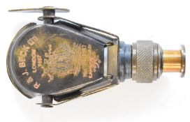 Brass monocular or telescope in the form of a gunpowder flask engraved 'R&J Beck Ltd London 1857 No.