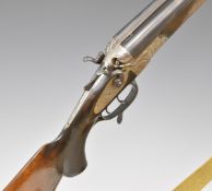 Remo 12 bore and .410 triple barrelled hammer action shotgun with engraved decoration, chequered