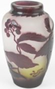 Emile Gallé style cameo glass vase with purple decoration of berries and foliage over a clear