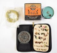 A wallet of trout fishing flies, JW Young fly fishing reel in box, Condex reel and fly line