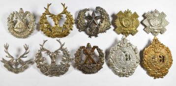 Ten British Army Scottish regiment badges including Gordons, Seaforth, Queen's Own Camerons and