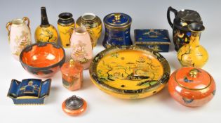 Carltonware lustre vases, bowls and covered pot decorated with fish, butterflies etc and a '