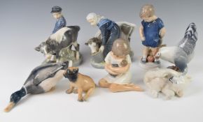 A collection of Copenhagen figures including milkmaid and boy, tallest 17cm