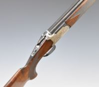 Lanber 12 bore over and under ejector shotgun with engraved lock, trigger guard, thumb lever, top