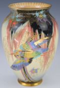 Carltonware Art Deco pedestal vase with enamelled decoration of a stork or egret, height 21cm