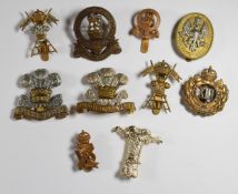 Ten British Army Cavalry Regiment badges including 10th Royal Hussars, 11th Hussars and 9th Lancers