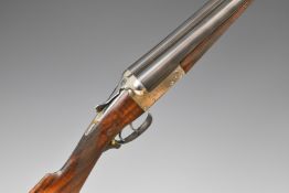 John Rigby & Co 12 bore side by side ejector shotgun with named lock, chequered grip and forend,