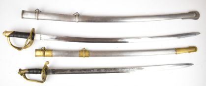 Two replica Cavalry swords, one with US to etched blade, both with scabbards, longest blade 87cm.