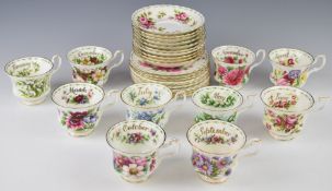 A collection of Royal Albert tea ware including multiple trios from the Flower of the Month series