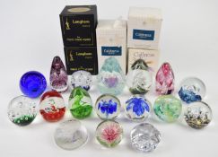 Seventeen Langham, Caithness, Mats Jonasson and similar glass paperweights including some limited
