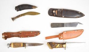 Five various knives including two hunting examples both made in Germany, William Rogers of Sheffield