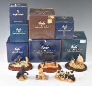A collection of Border Fine Arts dog / sheepdog figures including examples by Wall & Ayres, most
