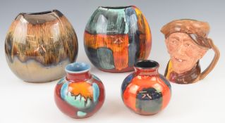 Four Poole Pottery vases and a Royal Doulton character jug 'Arry, tallest 18cm