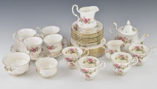 Royal Albert tea ware decorated in the Moss Rose pattern, approximately twenty five pieces