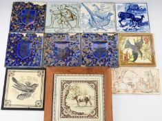 Eleven various ceramic tiles including Wedgwood, Minton, Maw & Co. and four armorial examples,
