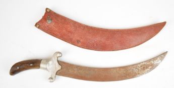 Eastern knife with alloy crosspiece, 25cm curved blade and leather sheath. PLEASE NOTE ALL BLADED