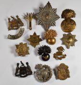 Seven British Army Guards Brigade badges including the Grenadier Coldstream Guards, Scots Guards and