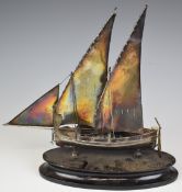 Large Maltese silver model of a sailing boat, with Maltese silver marks to keel, on ebonised base,