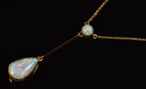 A c1915 9ct gold necklace set with round and pear cut opal cabochons of approximately 2ct & 0.3ct,
