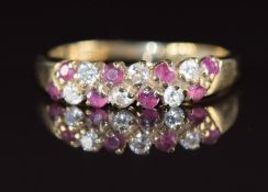 A 9ct gold ring set with rubies and cubic zirconia, 2.3g, size O