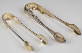 Two pairs of Victorian hallmarked silver sugar nips comprising a Scottish Queen's pattern example,