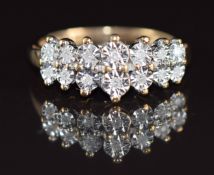 A 9ct gold ring set with diamonds in an illusion setting, 3.3g, size P