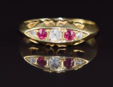 A c1900 18ct gold ring set with rubies and diamonds, 2.8g, size O