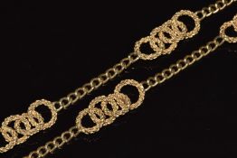 A 9ct gold necklace made up of curb links and textured interlocked circular links 70.6g, 90cm long
